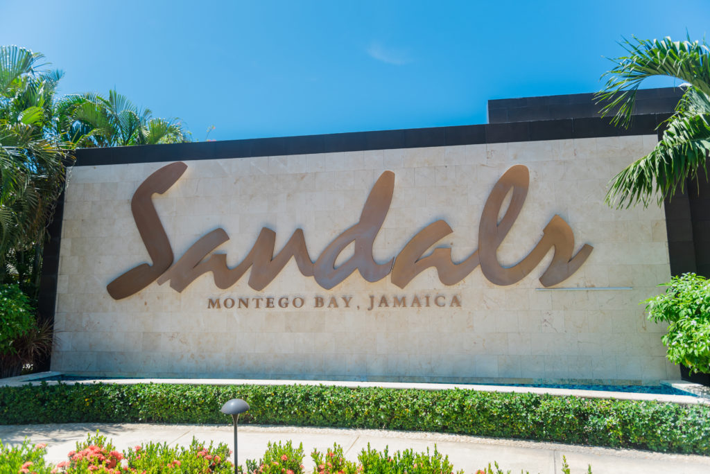 Sign that reads Sandals Montego Bay Jamaica