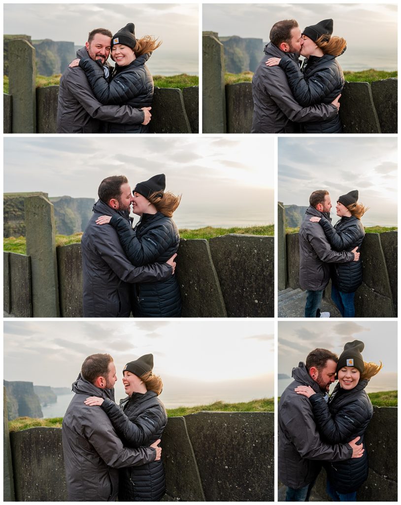 Couple cuddles on the Cliffs of Moher
